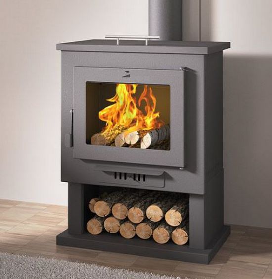 Double combustion wood stove with pyre and integrated 15 kW flat heater